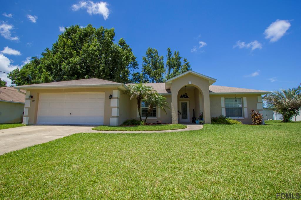 49 Woodbury Dr., Palm Coast, FL 32164