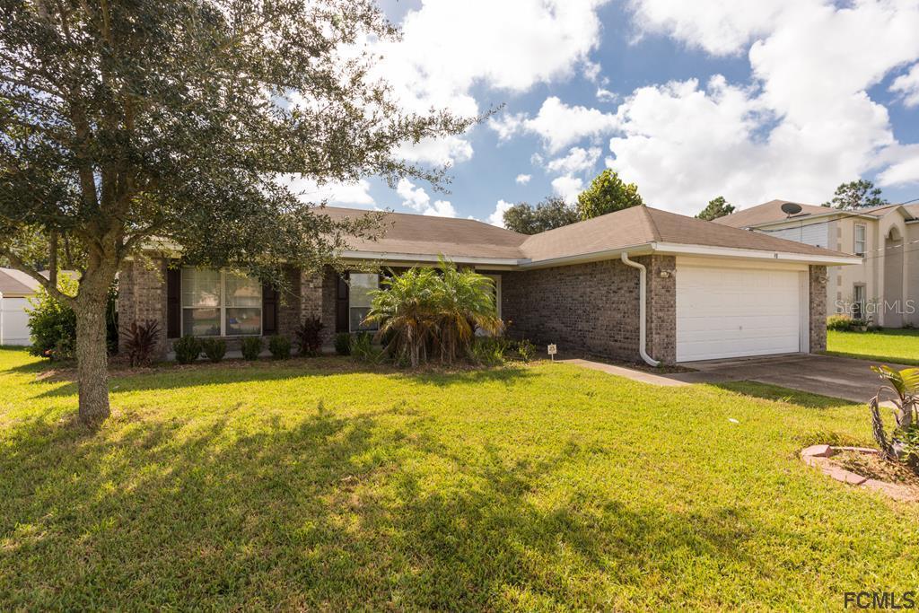 98 Bird Of Paradise Dr., Palm Coast, FL 32137