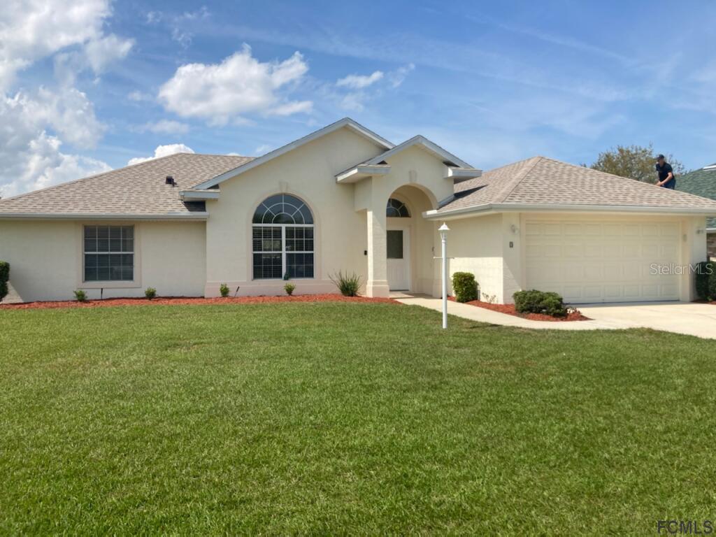 3 Lewis Dr., Palm Coast, FL 32137