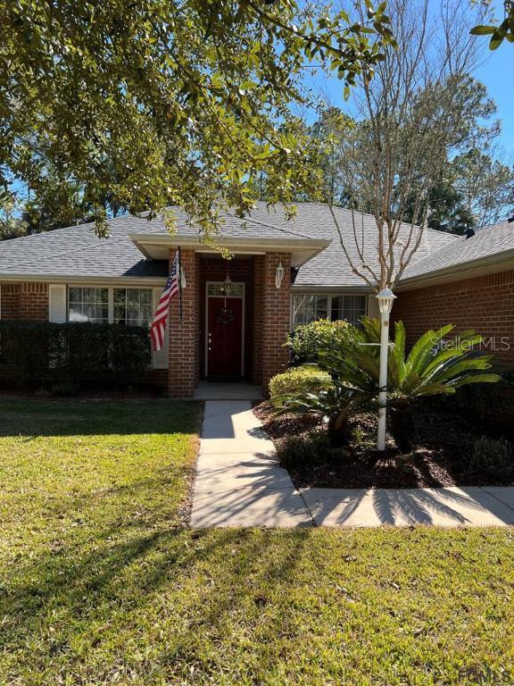 62 Postwood Dr., Palm Coast, FL 32164