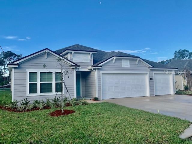 26 Point Of Woods Dr., Palm Coast, FL 32164