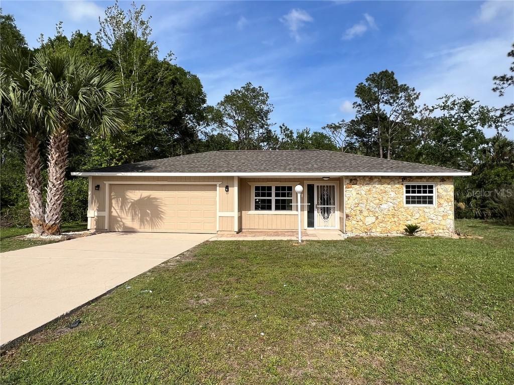 68 Whispering Pine Dr., Palm Coast, FL 32164