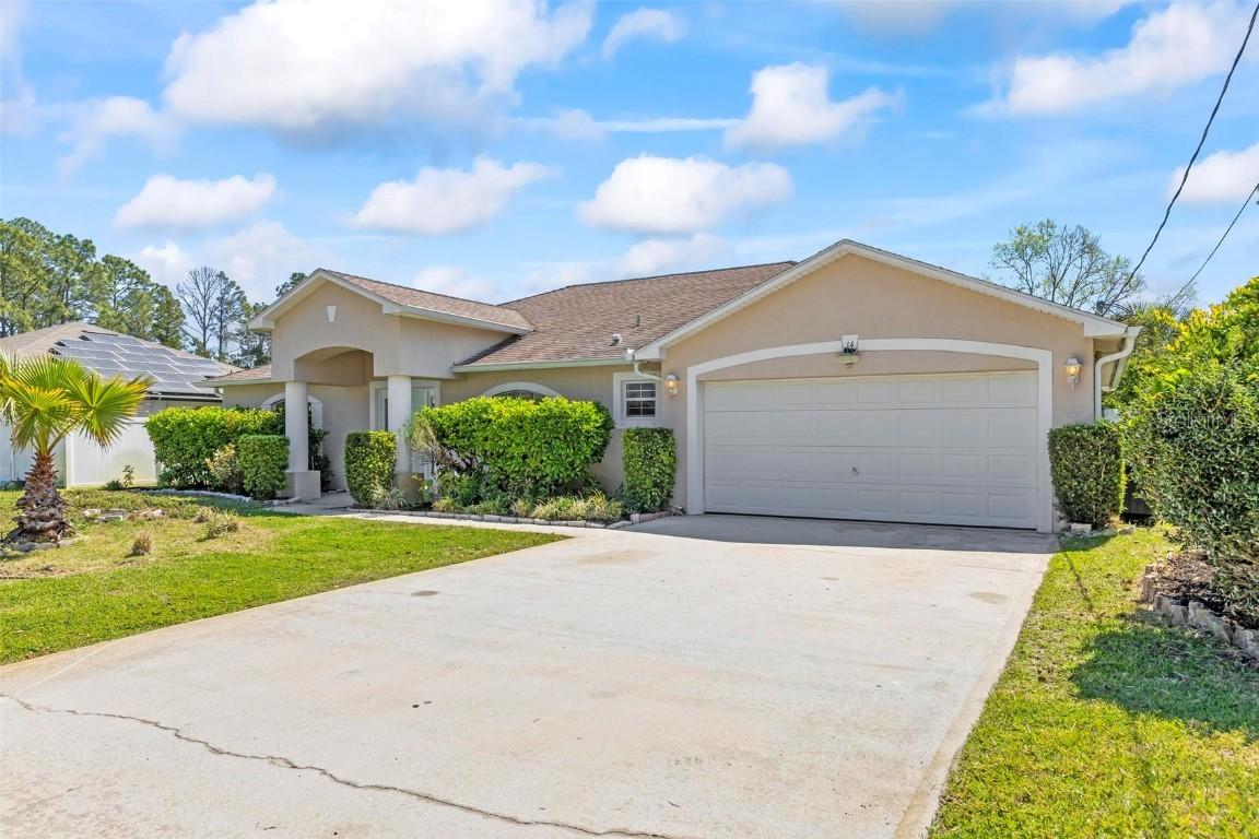 14 Pebble Wood Ln., Palm Coast, FL 32164
