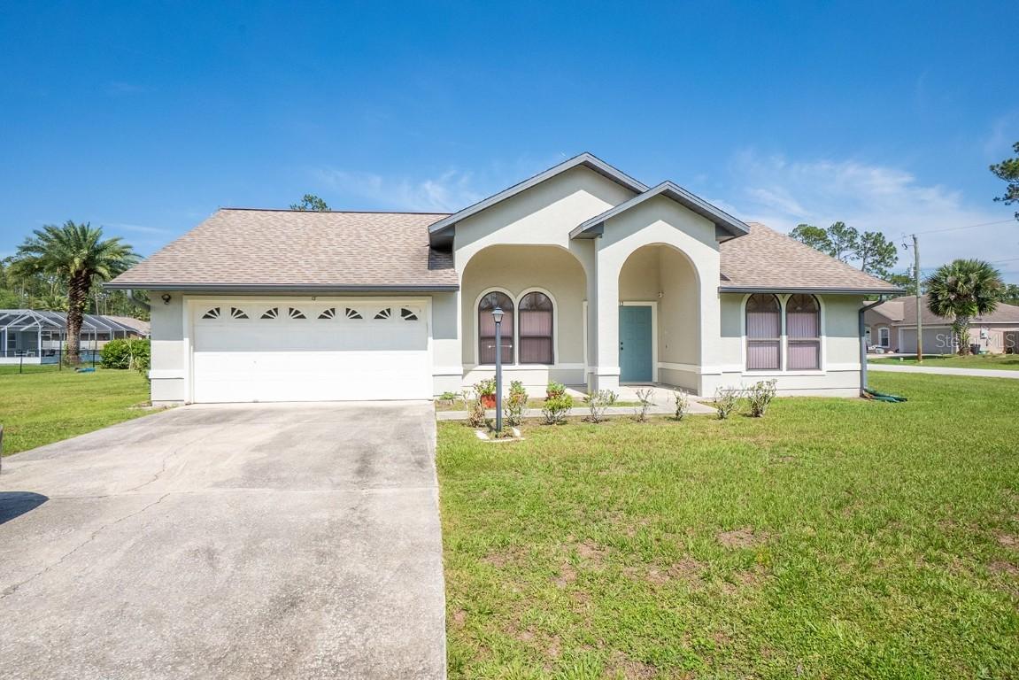 13 Point Of Woods Dr., Palm Coast, FL 32164