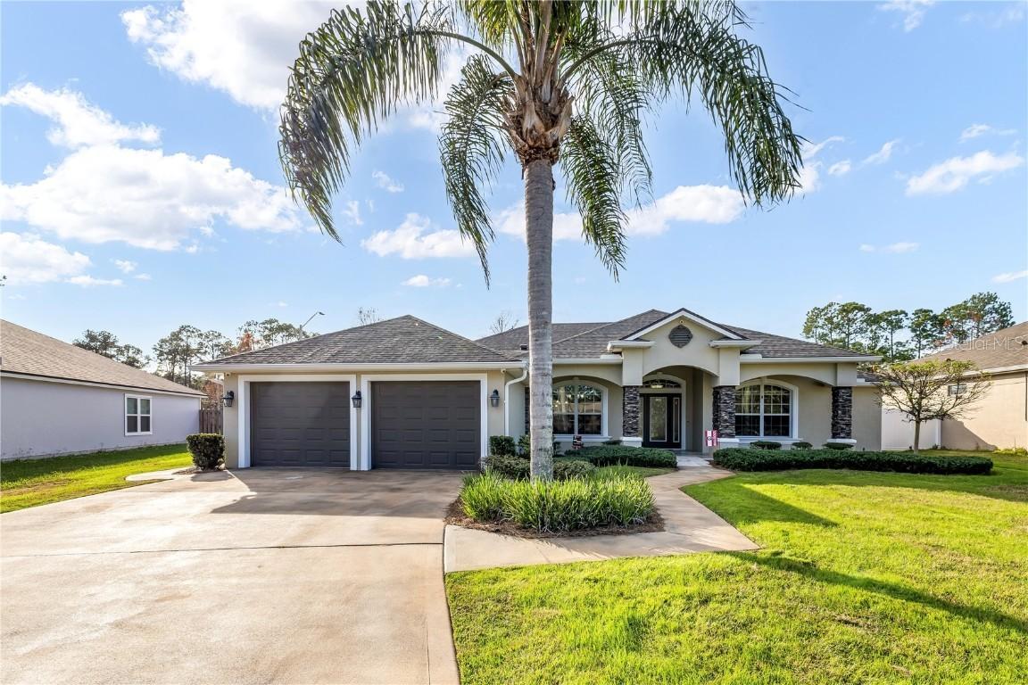 24 Point Of Woods Dr., Palm Coast, FL 32164