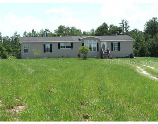 9742 Cockatoo Ln., Groveland, FL 34736