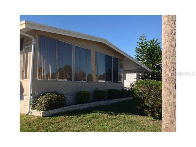 8 Cocos Plumosa Dr., Eustis, FL 32726