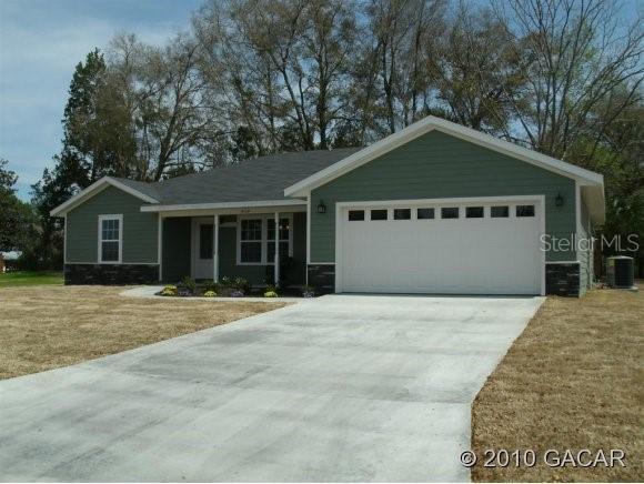 909 NW 254 Dr., Newberry, FL 32669