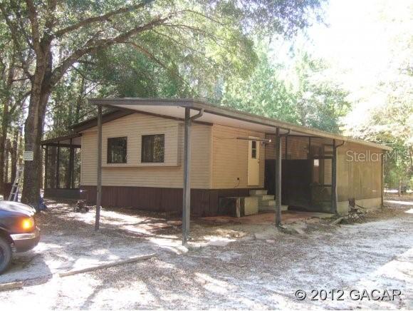 7541 NE 138th Ln., Newberry, FL 32669