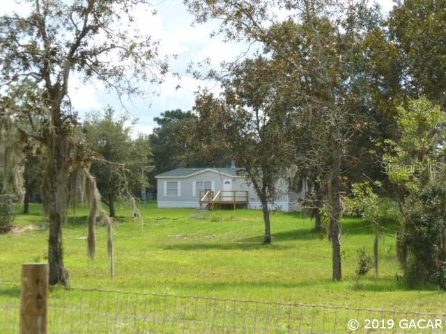 12650 SE 21st Pl., Morriston, FL 32668