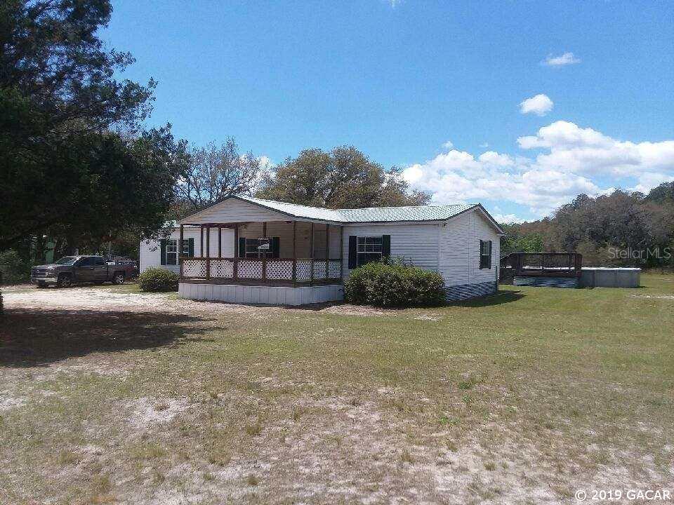 109 Tiki Court, Hollister, FL 32147