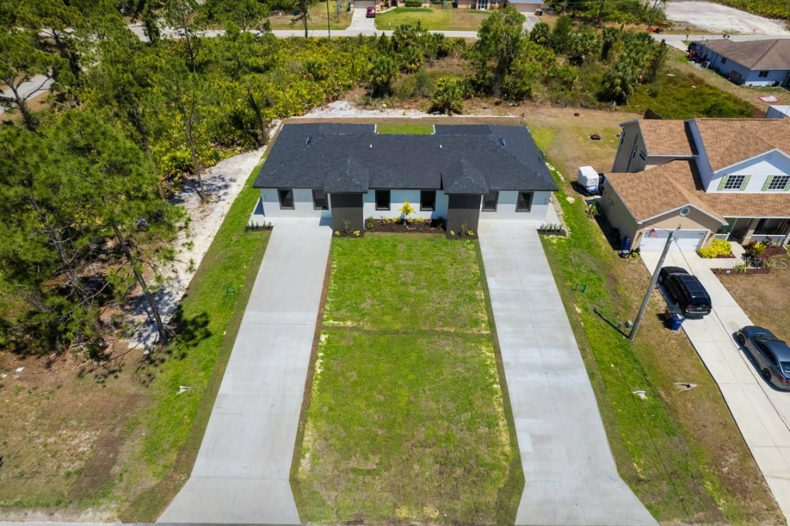 817/819 Eisenhower Blvd., Lehigh Acres, FL 33974