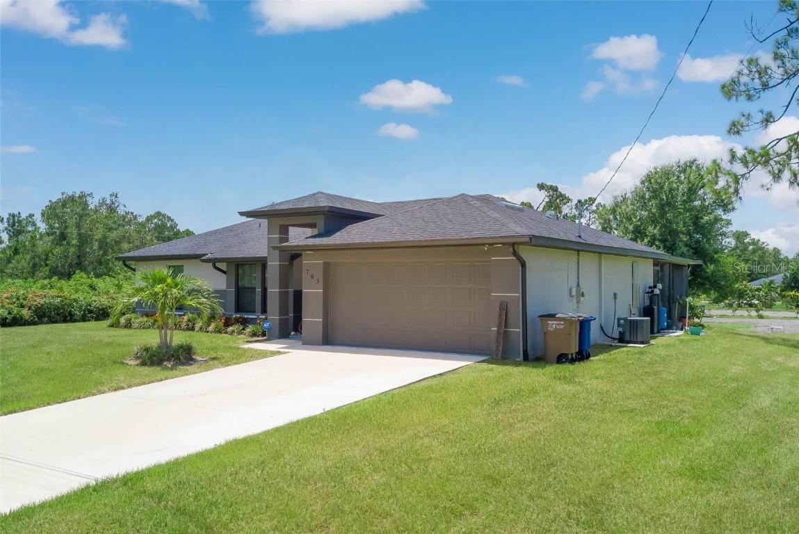 703 Wellington Ave., Lehigh Acres, FL 33972