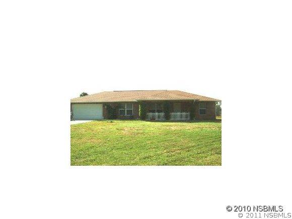 156 Flamingo Rd., Oak Hill, FL 32759
