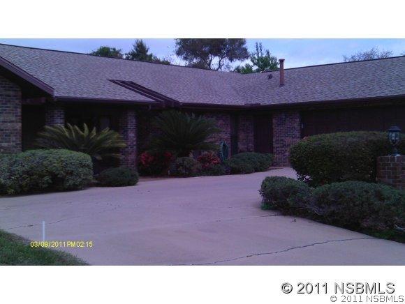 833 Sawgrass Ln., New Smyrna Beach, FL 32168