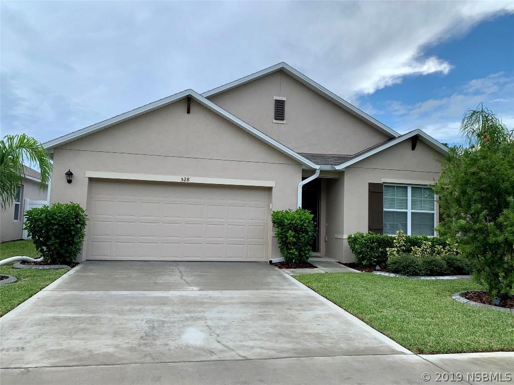 528 White Coral Ln., New Smyrna Beach, FL 32168