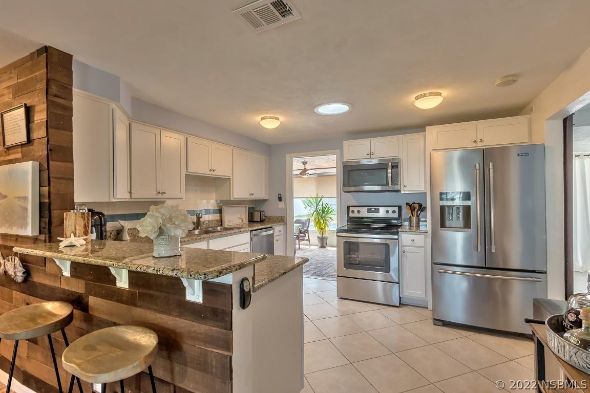 813 E 17th Ave., New Smyrna Beach, FL 32169