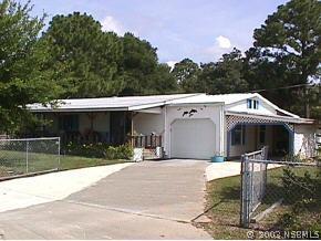 125 West Loop, Oak Hill, FL 32759