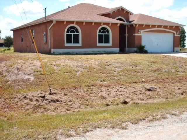 820 Plumosa Ave., Lehigh Acres, FL 33972