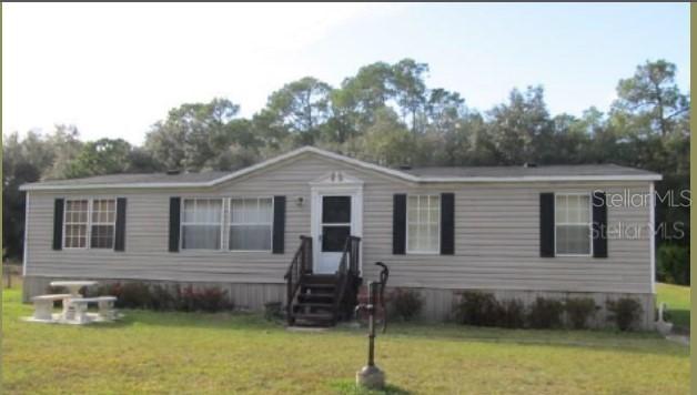 1364 Montzen Rd., Davenport, FL 33896