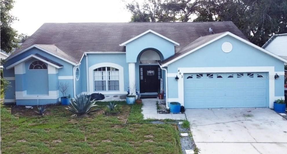402 Sunridge Woods Blvd., Davenport, FL 33837