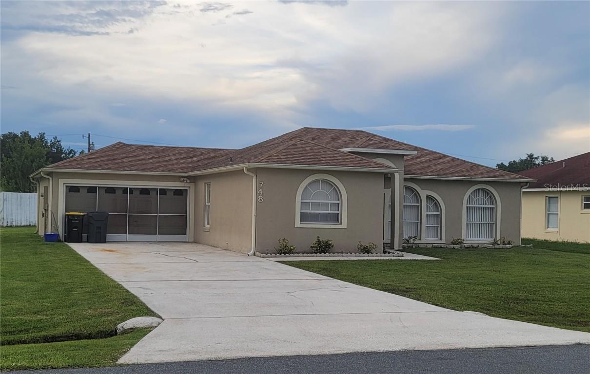 748 Cockatoo Ct., Poinciana, FL 34759