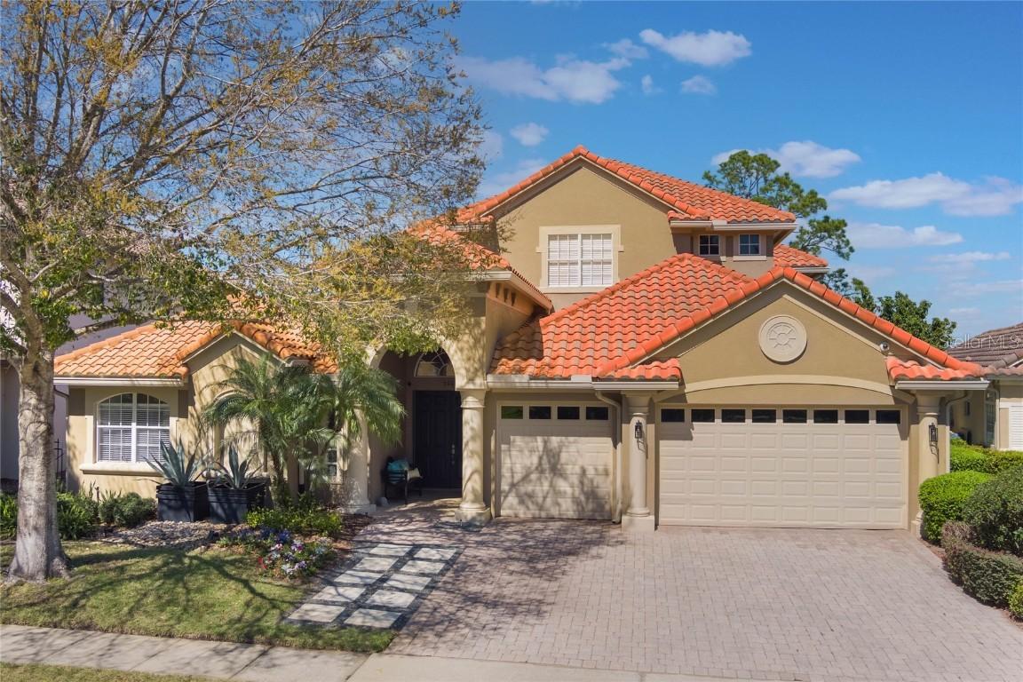2442 Heritage Green Ave., Davenport, FL 33837