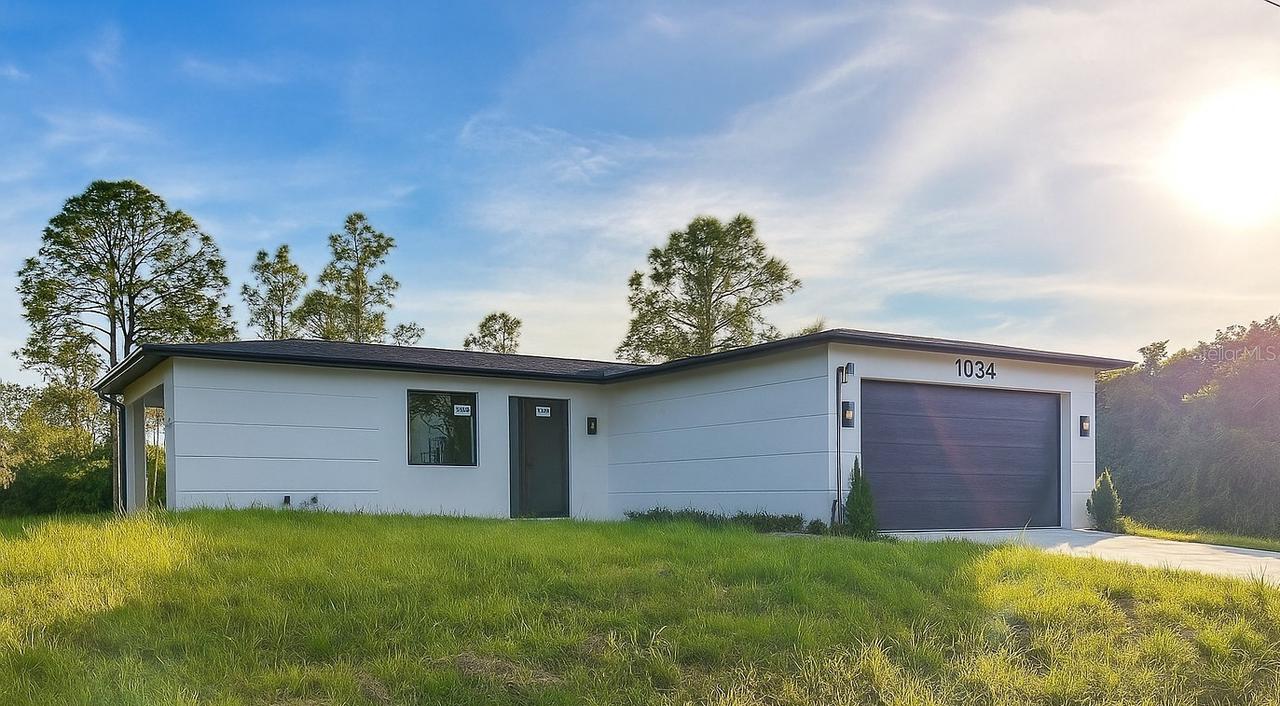 1034 Alcalde St, Lehigh Acres, FL 33974