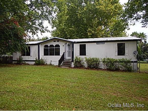 9091 SE Sunset Harbor Rd., Summerfield, FL 34491