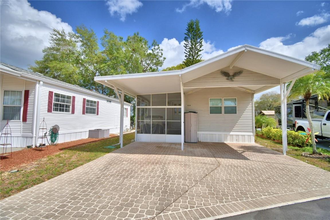 414 Gary Player Dr., Davenport, FL 33837