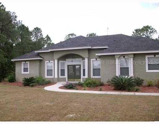 511 Hidden Palms Dr., Davenport, FL 33897