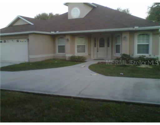 411 Dove Dr., Poinciana, FL 34759
