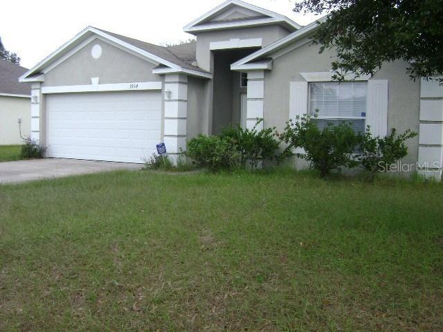 1954 Manatee Ct., Poinciana, FL 34759