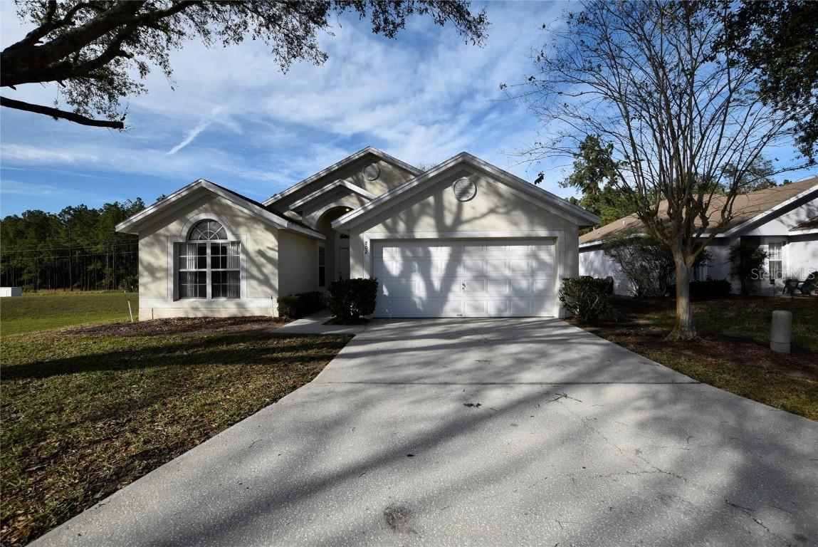 802 Pine Cone Dr., Davenport, FL 33897