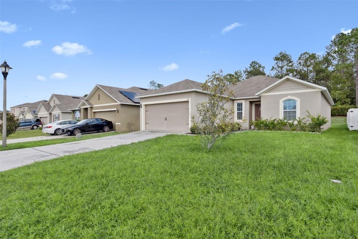 937 Shady Tree Ln., Davenport, FL 33897