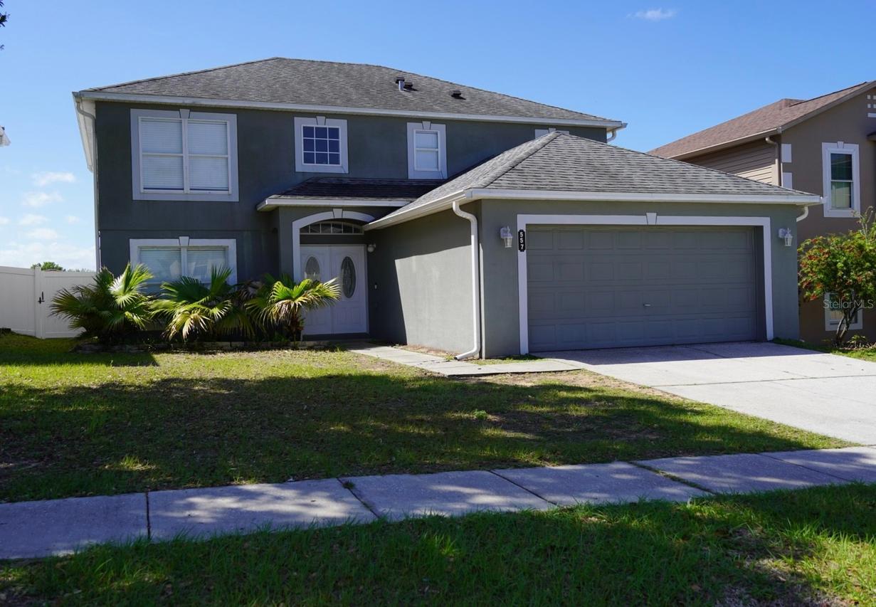 557 Milford St., Davenport, FL 33897