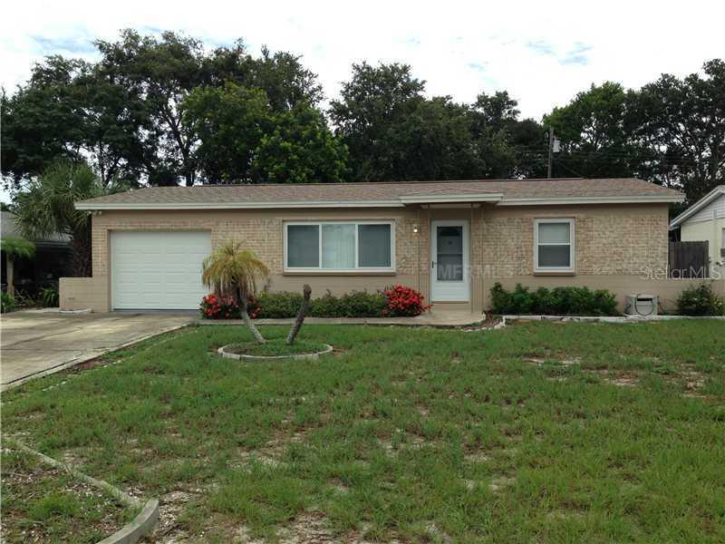 10473 Cirimoya Ln., Seminole, FL 33772