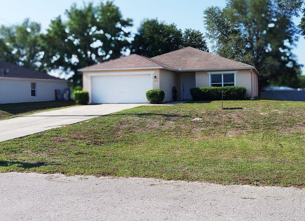 557 Windermere Dr., Lehigh Acres, FL 33972
