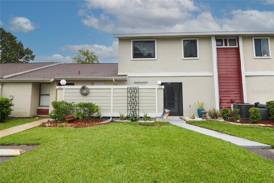 72 Pine Island Cir., Kissimmee, FL 34743