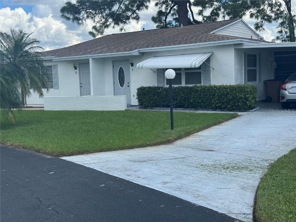 1 Aztec Lily Ln., Lehigh Acres, FL 33936