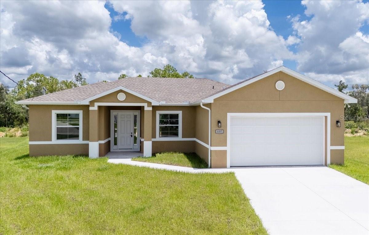 437 Mercedes Ct., Lehigh Acres, FL 33972