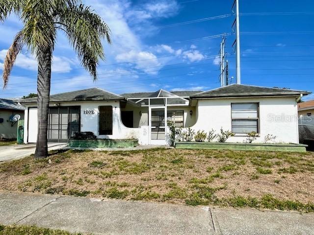 1202 Mandarin Dr., Holiday, FL 34691