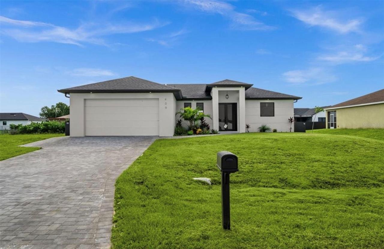 409 NW 25th Pl., Cape Coral, FL 33993