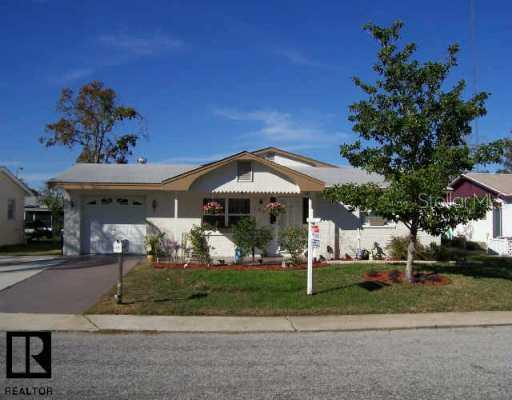 1401 Wickham Ln., Holiday, FL 34691