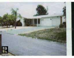 3246 Kimberly Oaks Dr., Holiday, FL 34691