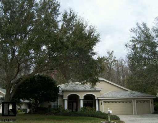 945 Cobblestone Ln., Tarpon Springs, FL 34688