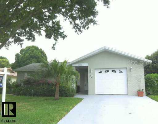 1306 Woodstock Dr., Palm Harbor, FL 34684