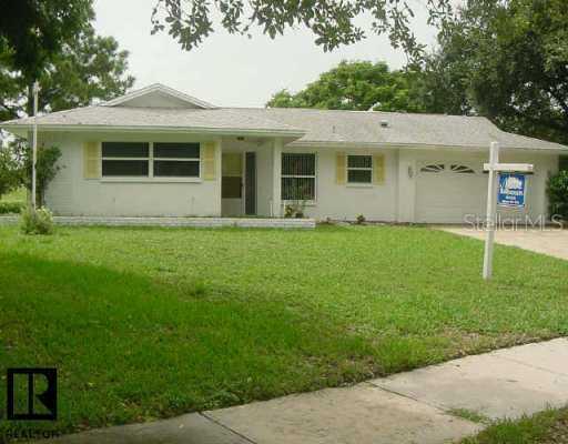 1322 Woodstock Dr., Palm Harbor, FL 34684