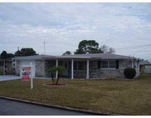 3831 Cedarwood Dr., Holiday, FL 34691