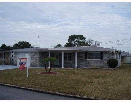 3831 Cedarwood Dr., Holiday, FL 34691